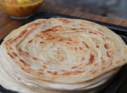 Malabar Parotta (2 pieces) served with 8 oz Veg Salna & Raita